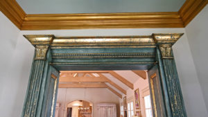 Sylvia T Designs - A gilded (gold leaf) and finished archway in a New Orleans residence.