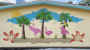 Sylvia T Designs – One of two fun, branded external murals that great guests with the right vibe in the parking lot of Liz’s Where Y’at diner in Mandeville, across the lake from New Orleans.