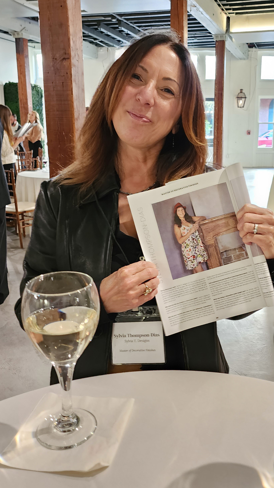 Sylvia Thompson-Dias of Sylvia T Designs shows off her New Orleans Magazine profile for their 2022 Design Masters award at the magazine’s recent ceremony.